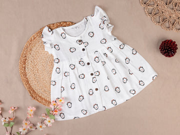 white with penquin Frock